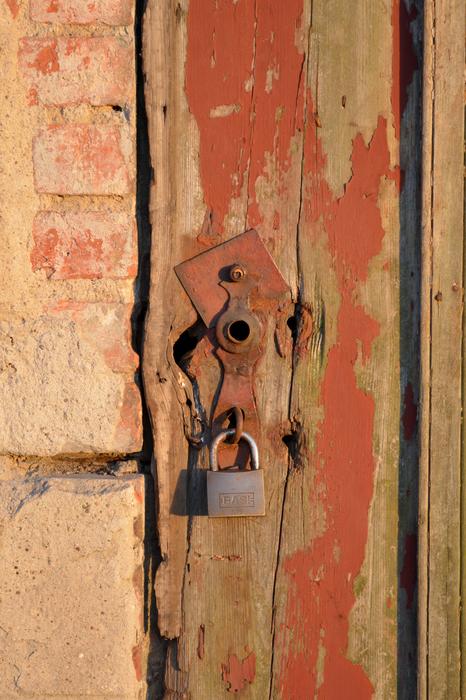 old lock on a wooden door