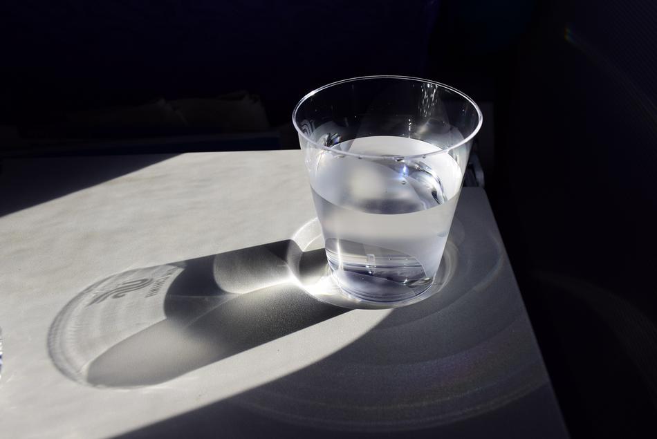 plastic cup of water on the table
