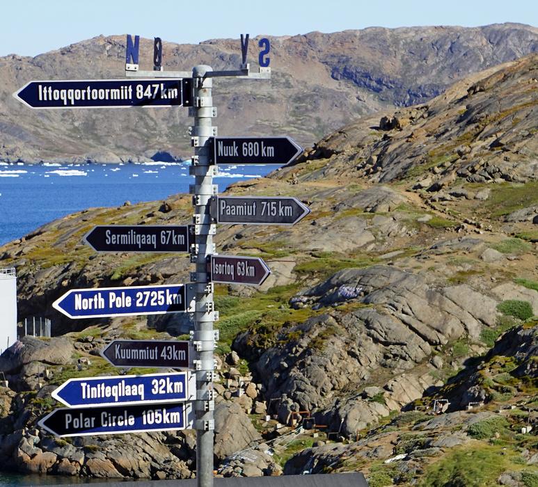 iron signs on top of the mountain