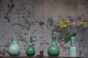 green vases in still life