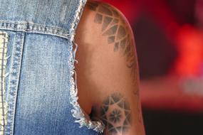 Geometric tattoo on the arm