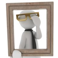 model of a man in glasses in a frame