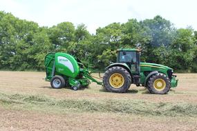 green tractor in the field