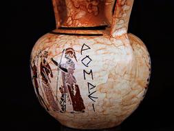 old vase with writing on it