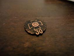 old bronze medal on the table