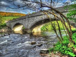 beautiful stone fence over the river