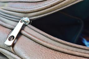 padlock on a leather bag
