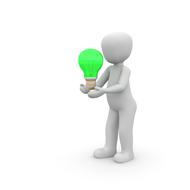 model of a man with a green light bulb