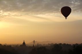 cityscape with a flying balloon