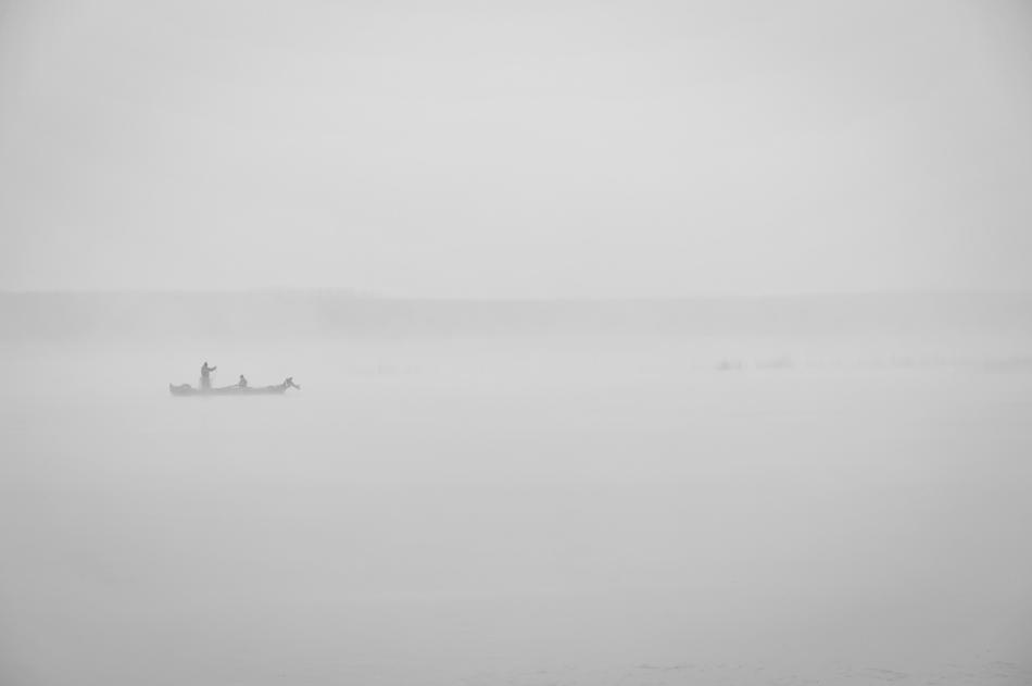 floating boat in the fog