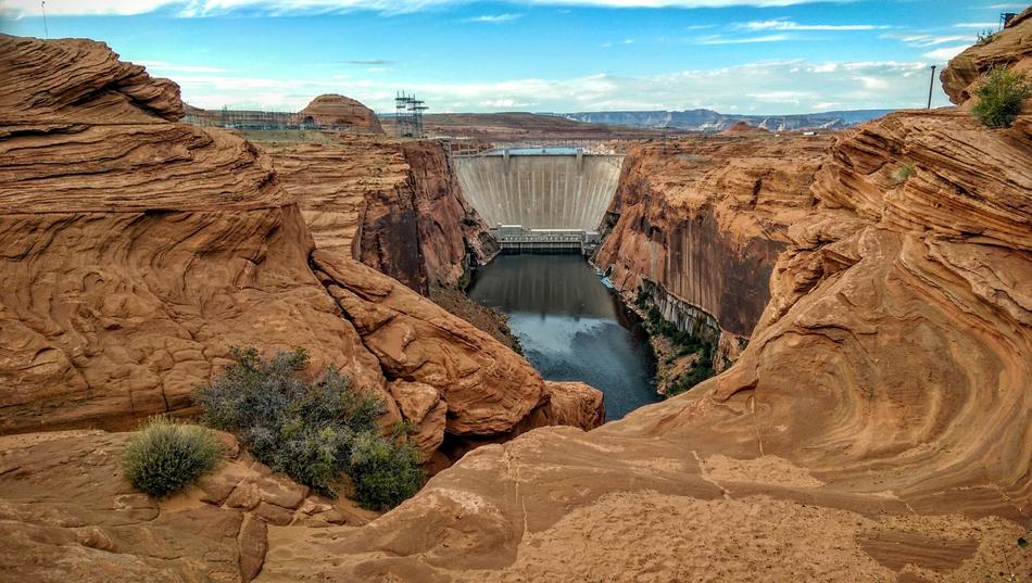 dam near the lake in the rocks