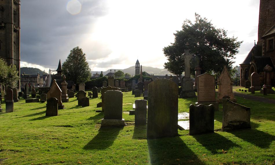emetery with graves in the grass