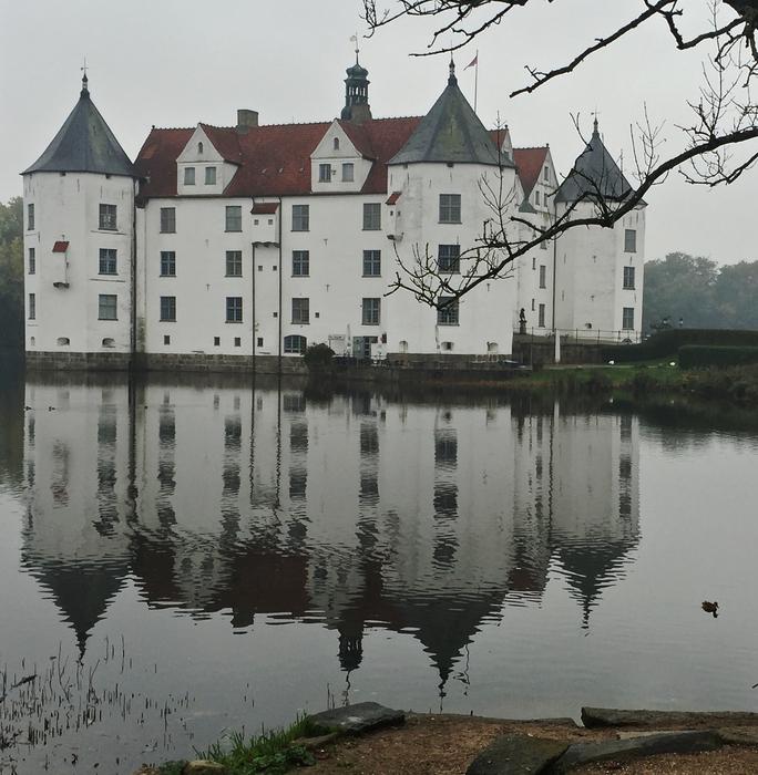 beautiful white castle by the lake