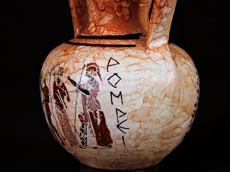 old vase with writing on it
