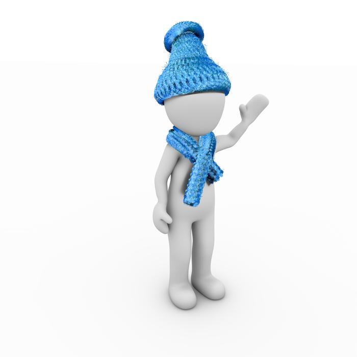 model of a man in a hat and scarf