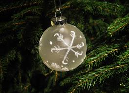white christmas ball on a tree