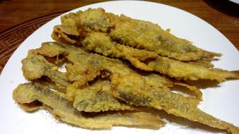 fried delicious fish on a plate