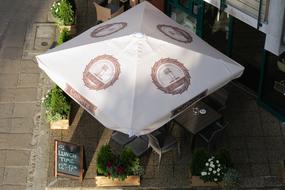 white umbrella over the table