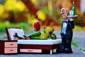 Ceramic frog with a waiter