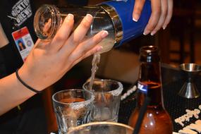 bartender prepares cocktails