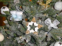 white beautiful ornaments on a tree