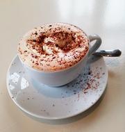 Hot cappuccino with chocolate chips