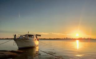 A lonely yacht in the blazing sun
