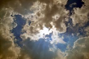 sun in white clouds