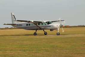 airplane on a green field