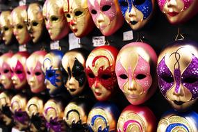 colored masks on the wall