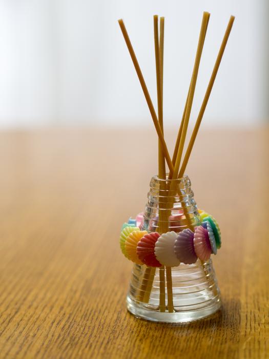fragrant candles in a glass vase