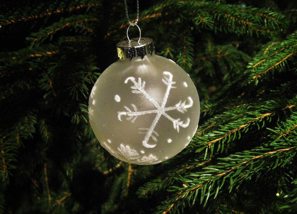 white christmas ball on a tree