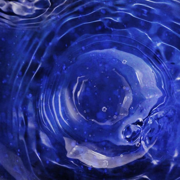 drops of water in the blue liquid