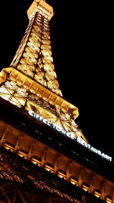 luminous tower of paris in the night