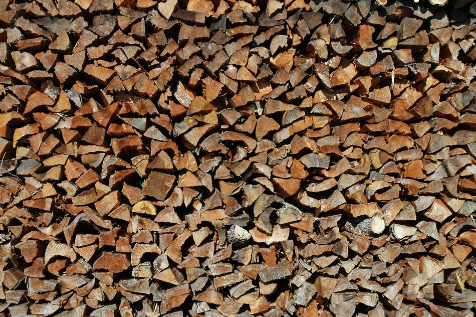 Close-up of the colorful and beautiful wood logs stacked up