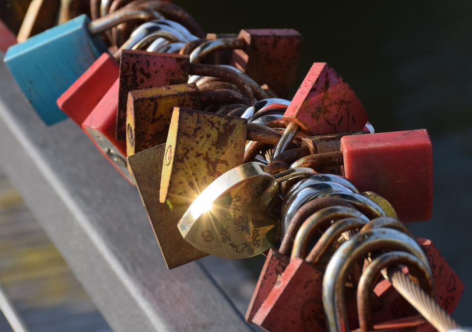 old locks on a bridge in the city