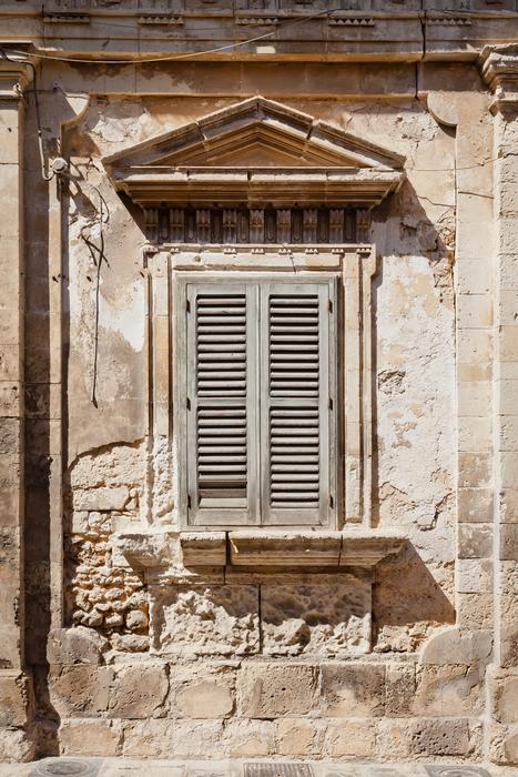 window closed with shutters, old building detail, Italy, Sicily, Ragusa