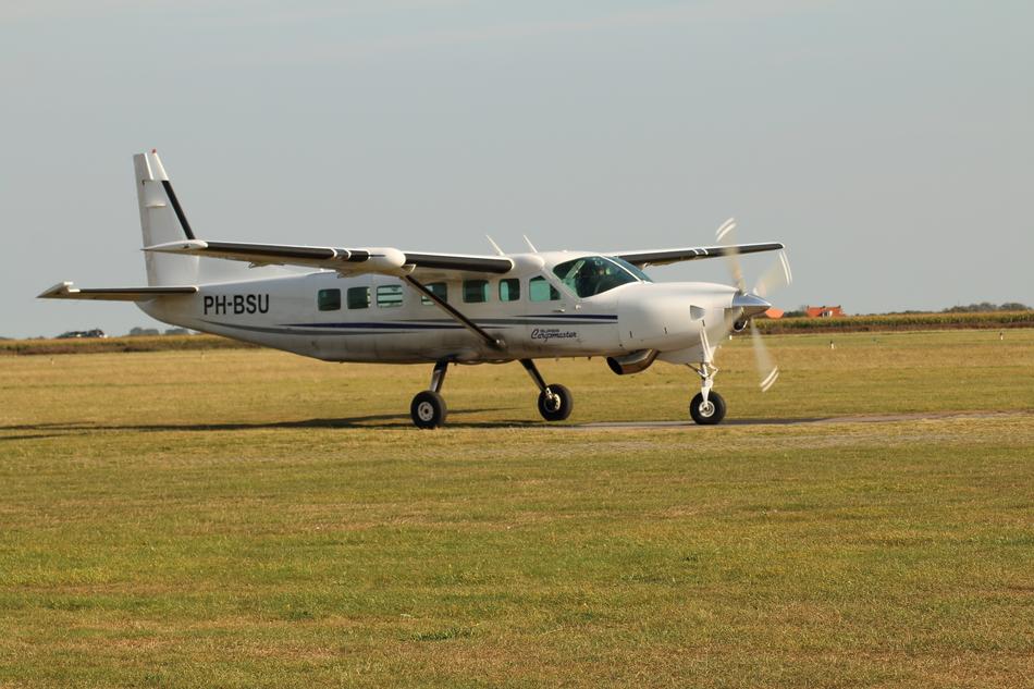 airplane on a green field