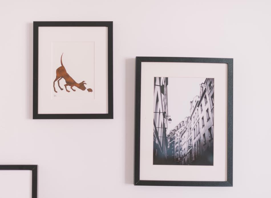 Pictures in dark Frames on wall