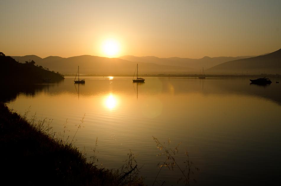 boats in bay at sunrise, Turkey, Fethiye