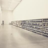 lot of files on long shelves at wall, nobody