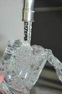 splashing water from the faucet