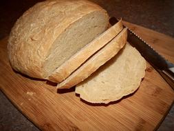 sliced delicious bread with a knife