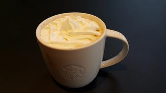 creamy drink in a cup
