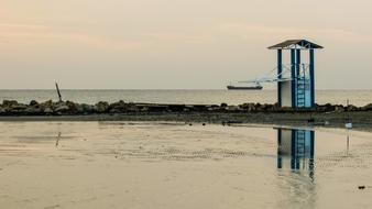 watchtower on beach early at morning, Cyprus, Larnaca
