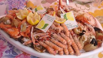 Seafood with lemon on a plate