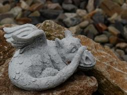 sleeping stone dragon figure