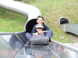 Merry kids on the slide