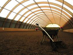 construction wheelbarrow in the greenhouse