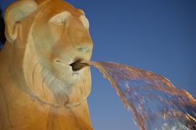 fountain in the form of a sculpture of a lion